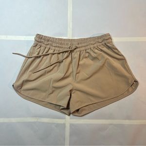 Aritzia TNA Alayli Running Short Sand Bluff